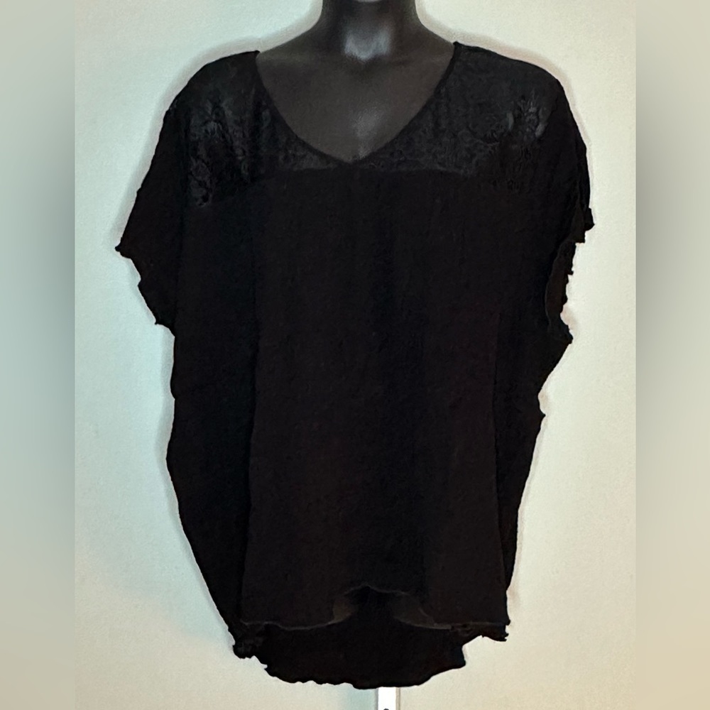 Torrid size 6 black gauze like and lace shirt.